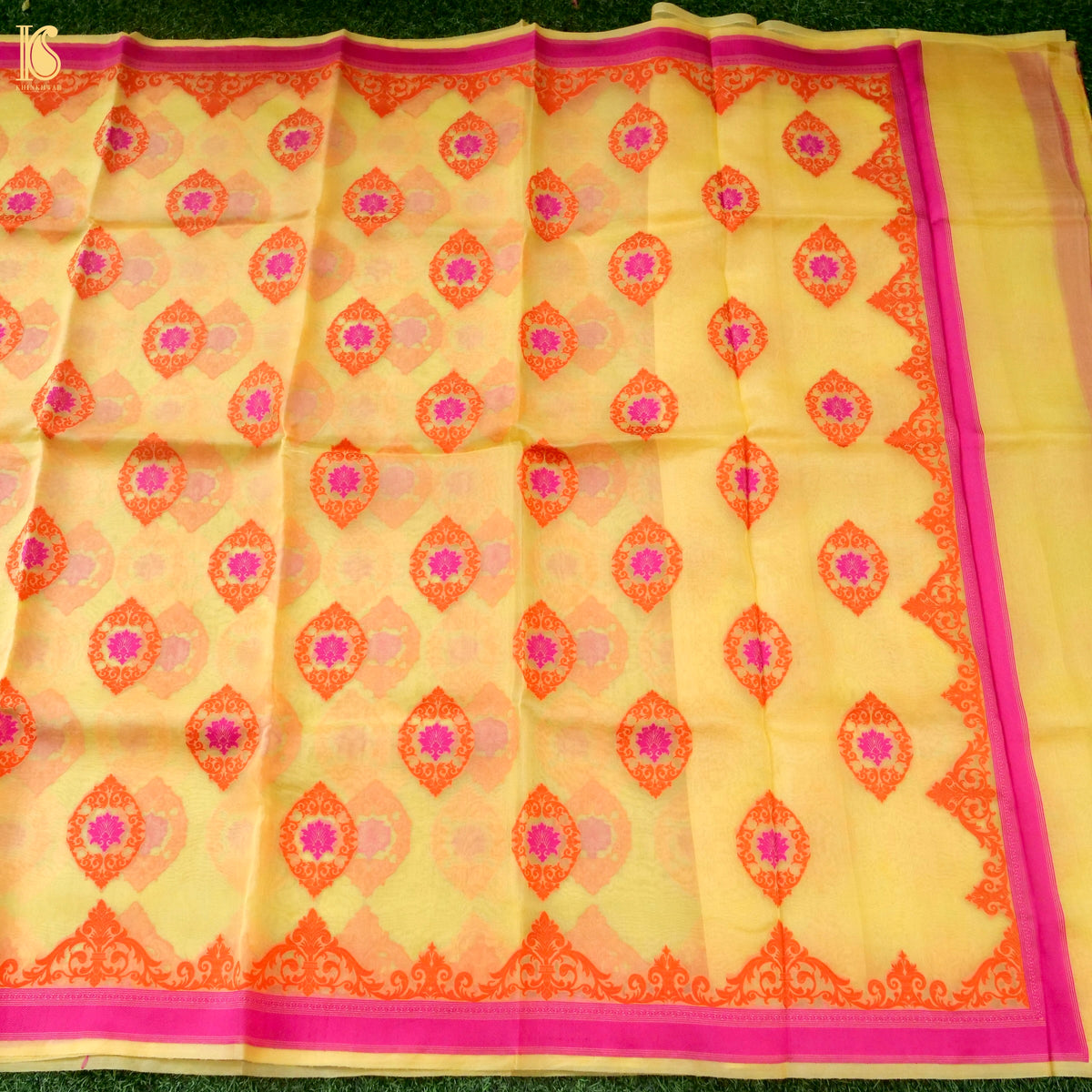 Handwoven Banarasi Organza silk saree in butter yellow with intricate kora work, crafted by Khinkhwab.