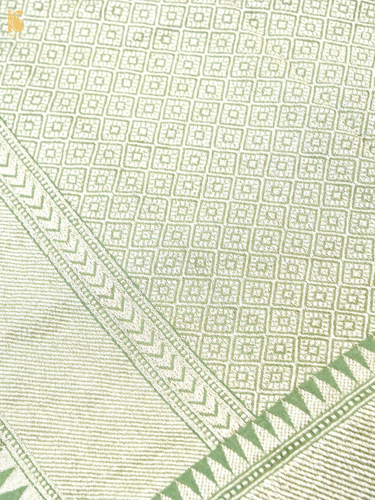 Khinkhwab Banarasi Tussar Georgette Meenakari cutwork saree in sage green with ornate woven detailing