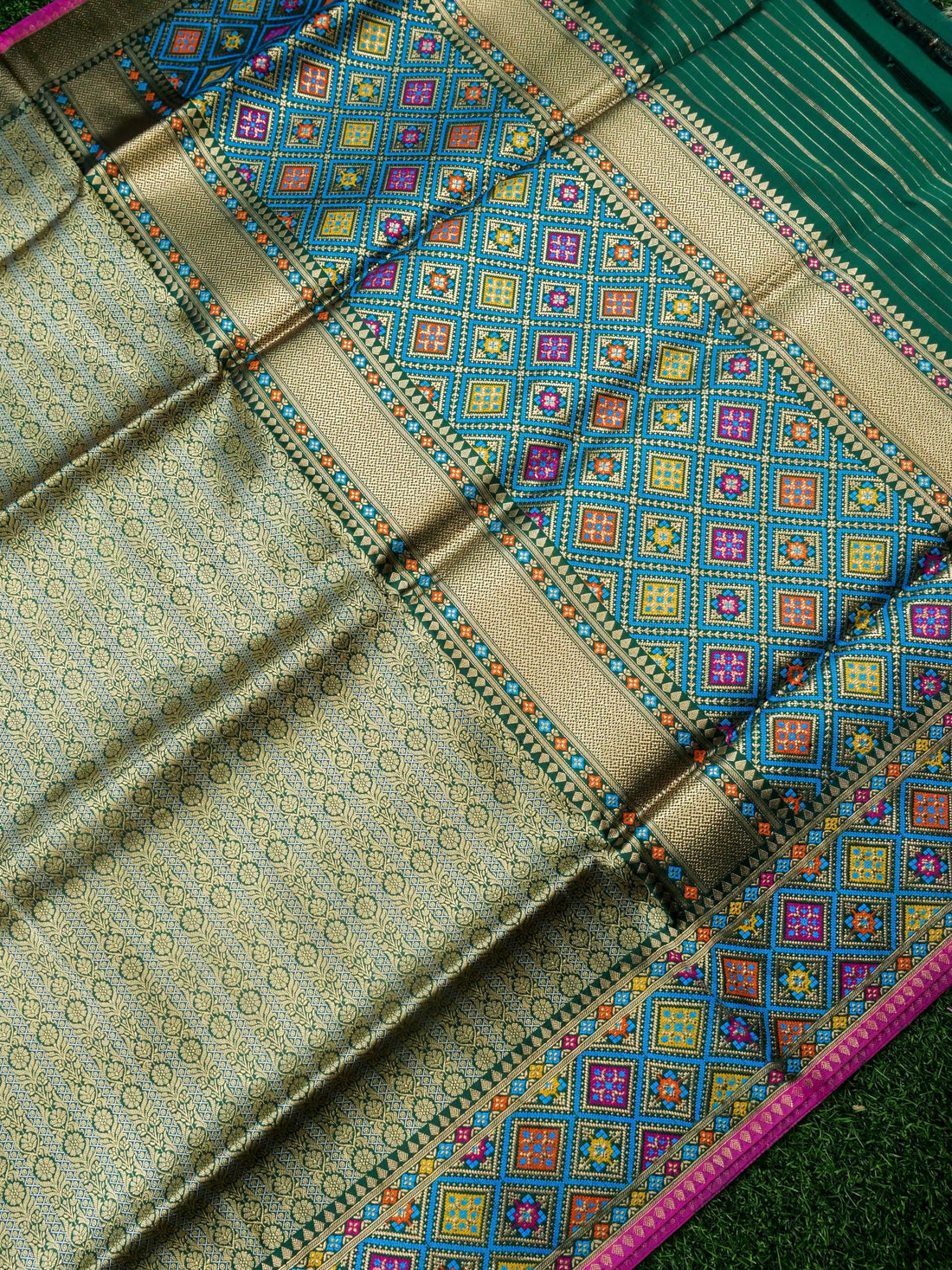 Handwoven Banarasi Katan Silk Patola Border Saree in Bottle Green and Blue