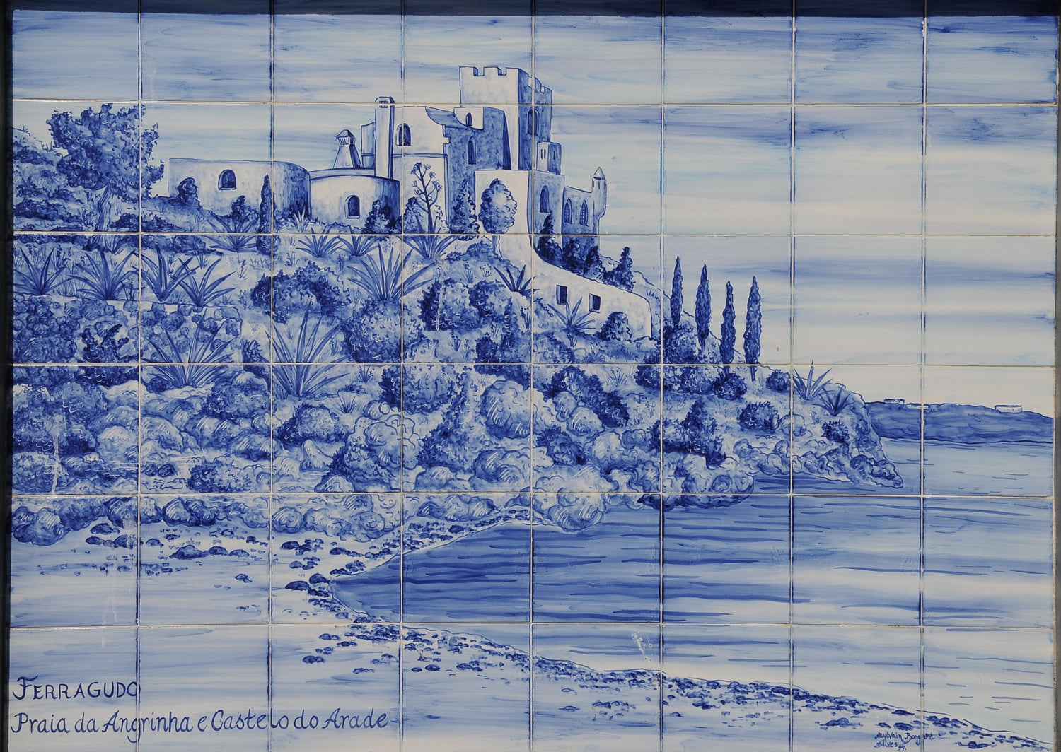 Portuguese azulejos — blue-and-white tin-glazed tiles, Ferragudo, Portugal, via Wikimedia Commons