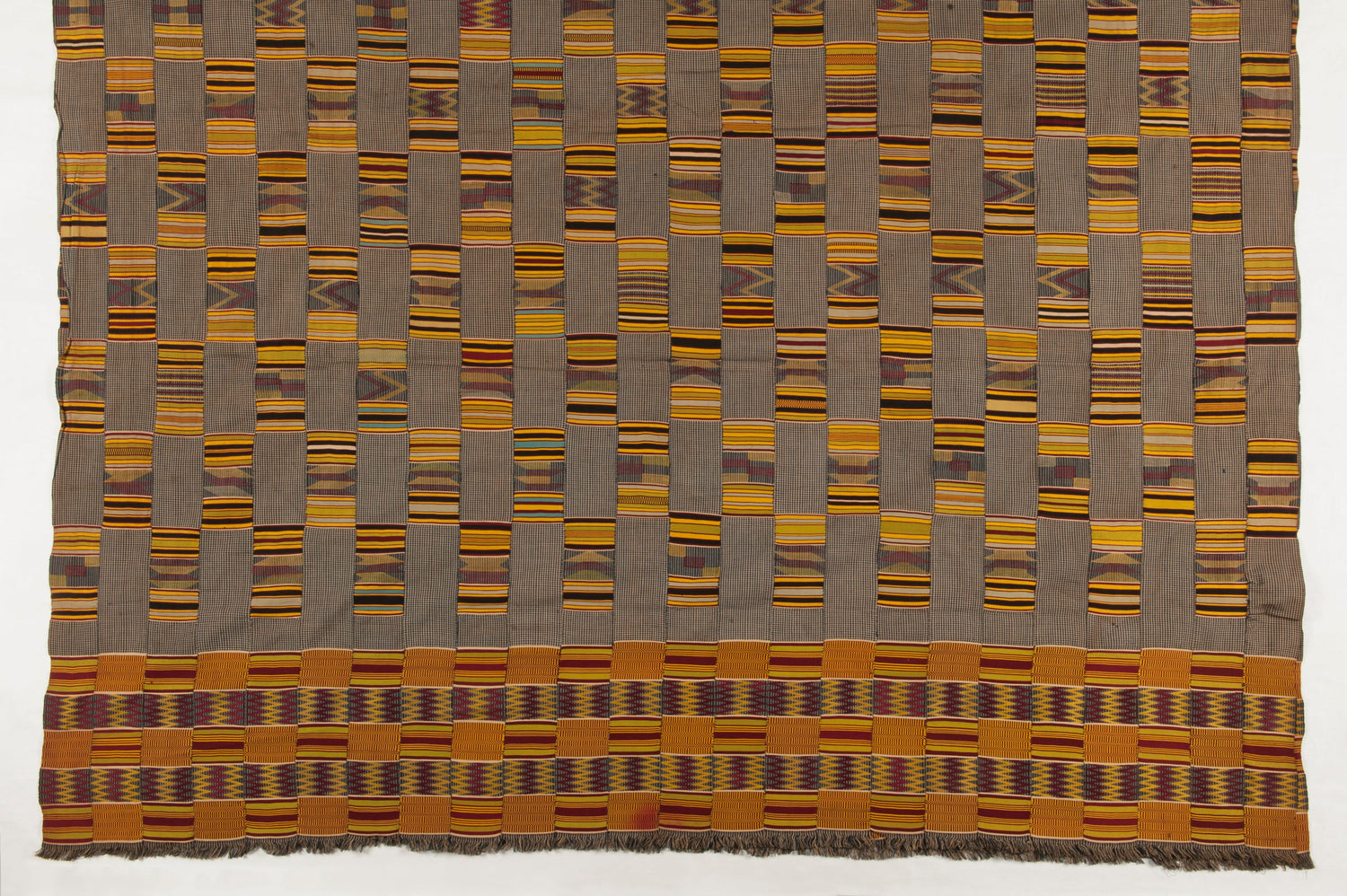 Asante kente cloth for a man, strip-woven, Ghana — Nationaal Museum van Wereldculturen, via Wikimedia Commons