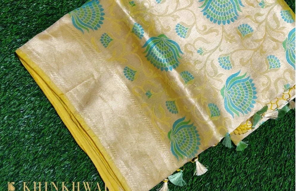 Close detail of real zari woven into a Banarasi saree