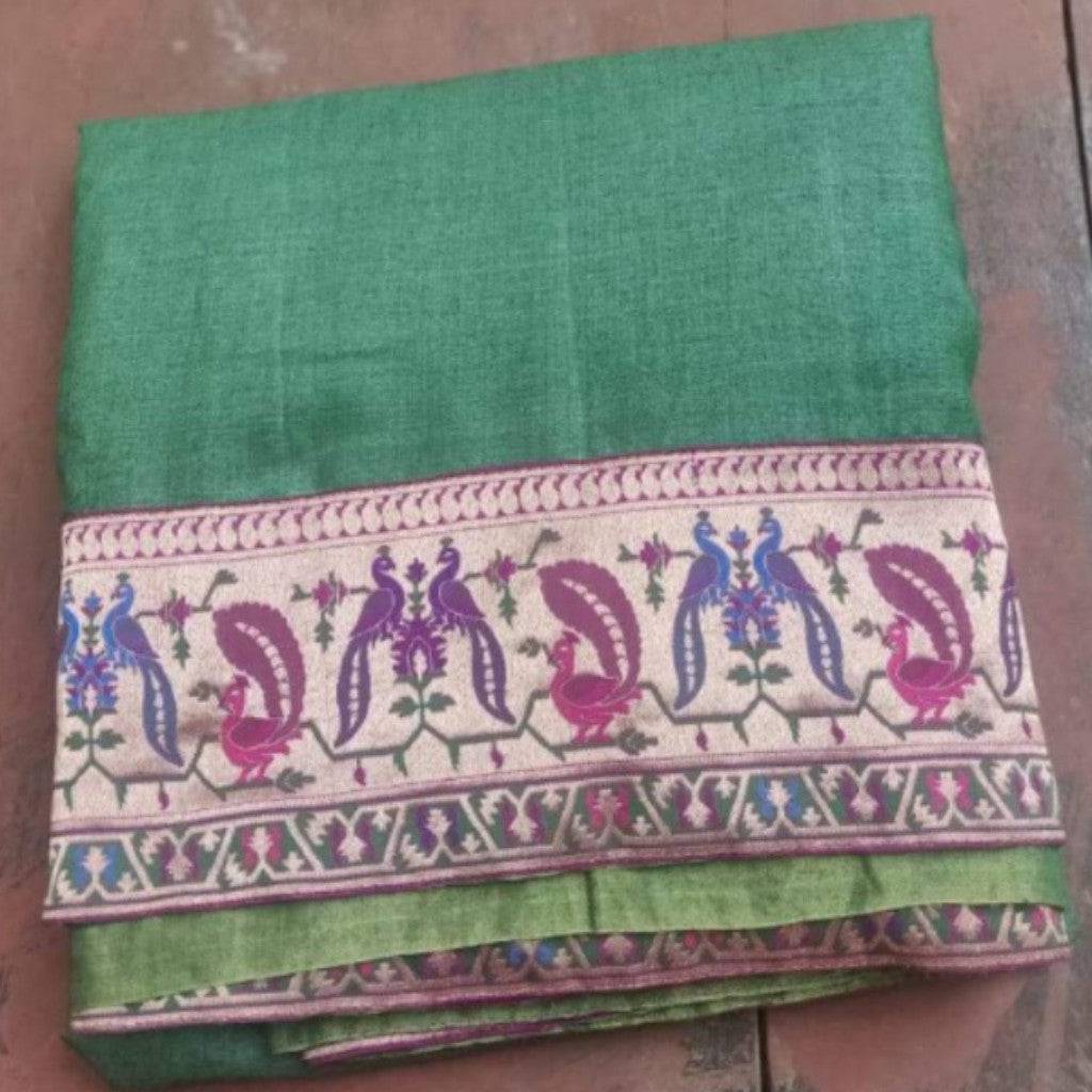 A green pure Tussar silk handwoven Banarasi saree for a mehendi