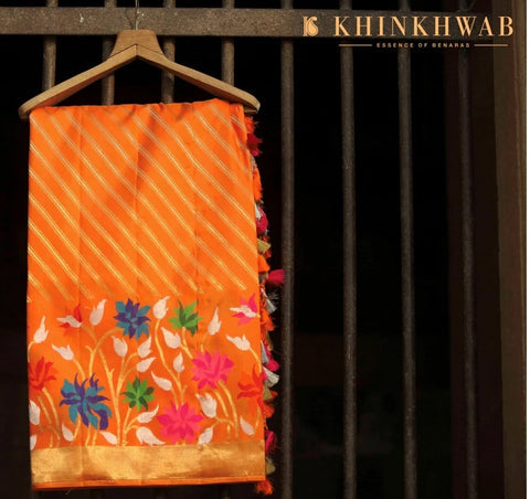A carrot-orange pure silk handloom Banarasi saree for the first day of Navaratri