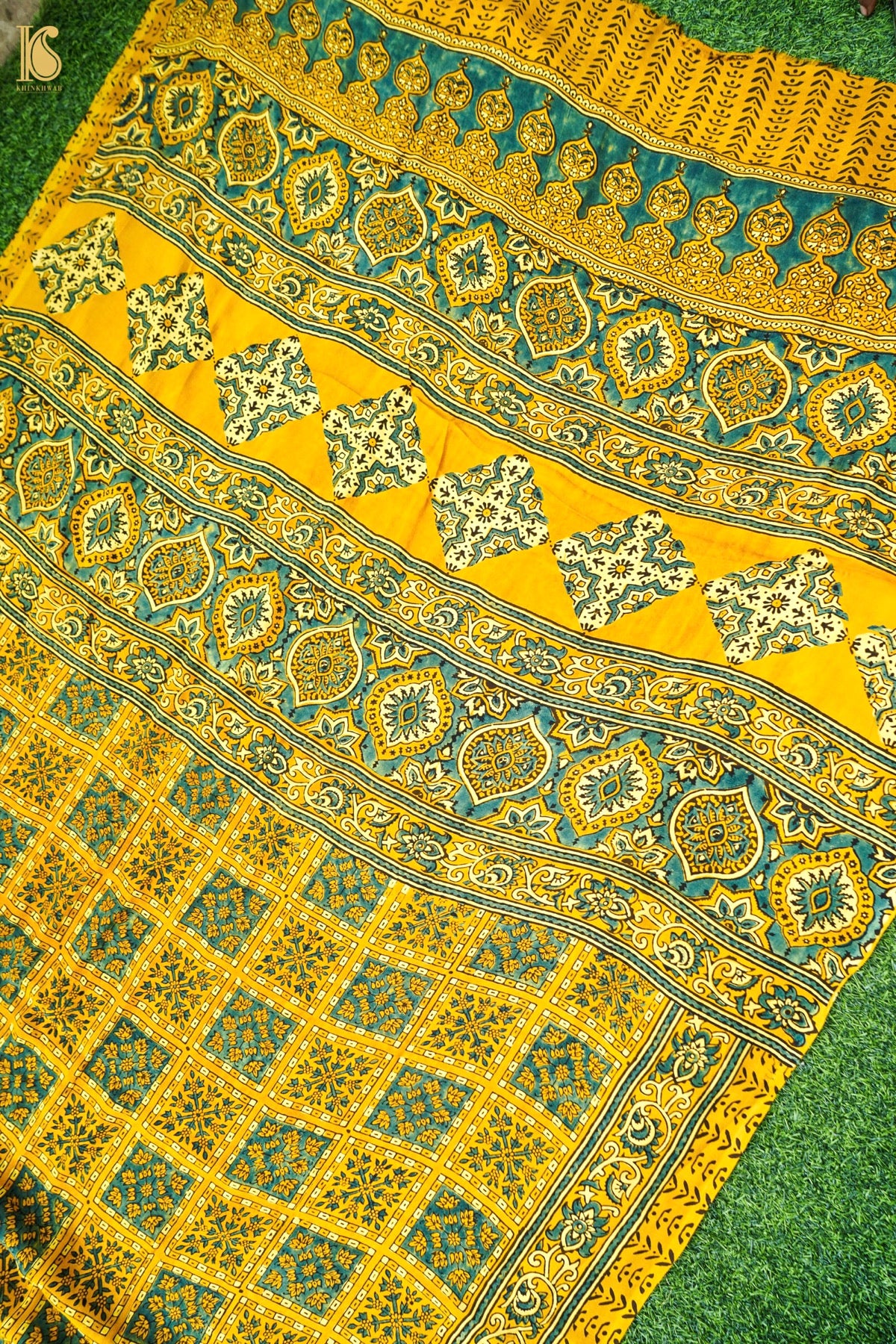 Modal Silk Ajrakh Hand Block Charkhana Banarasi Saree in Mustard Teal