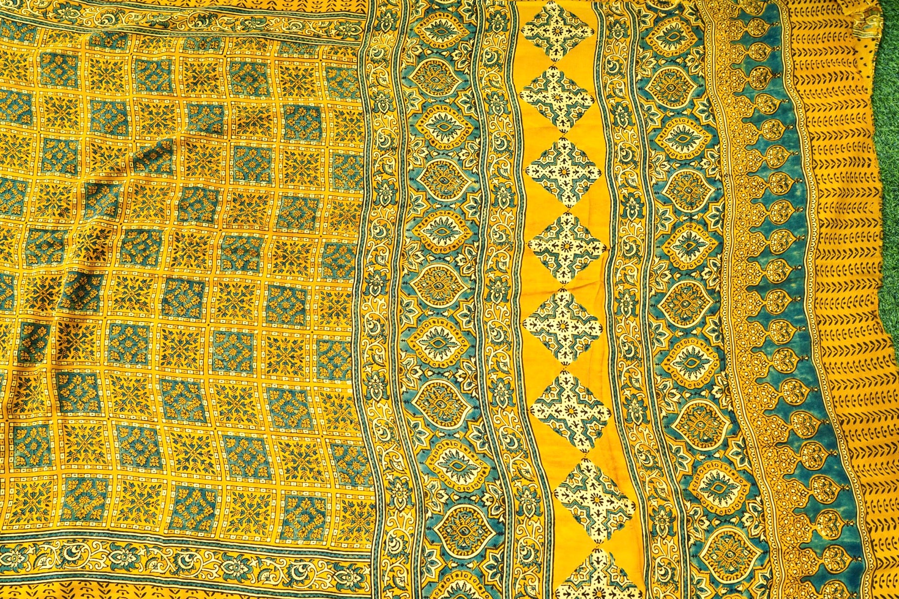 Modal Silk Ajrakh Hand Block Charkhana Banarasi Saree in Mustard Teal
