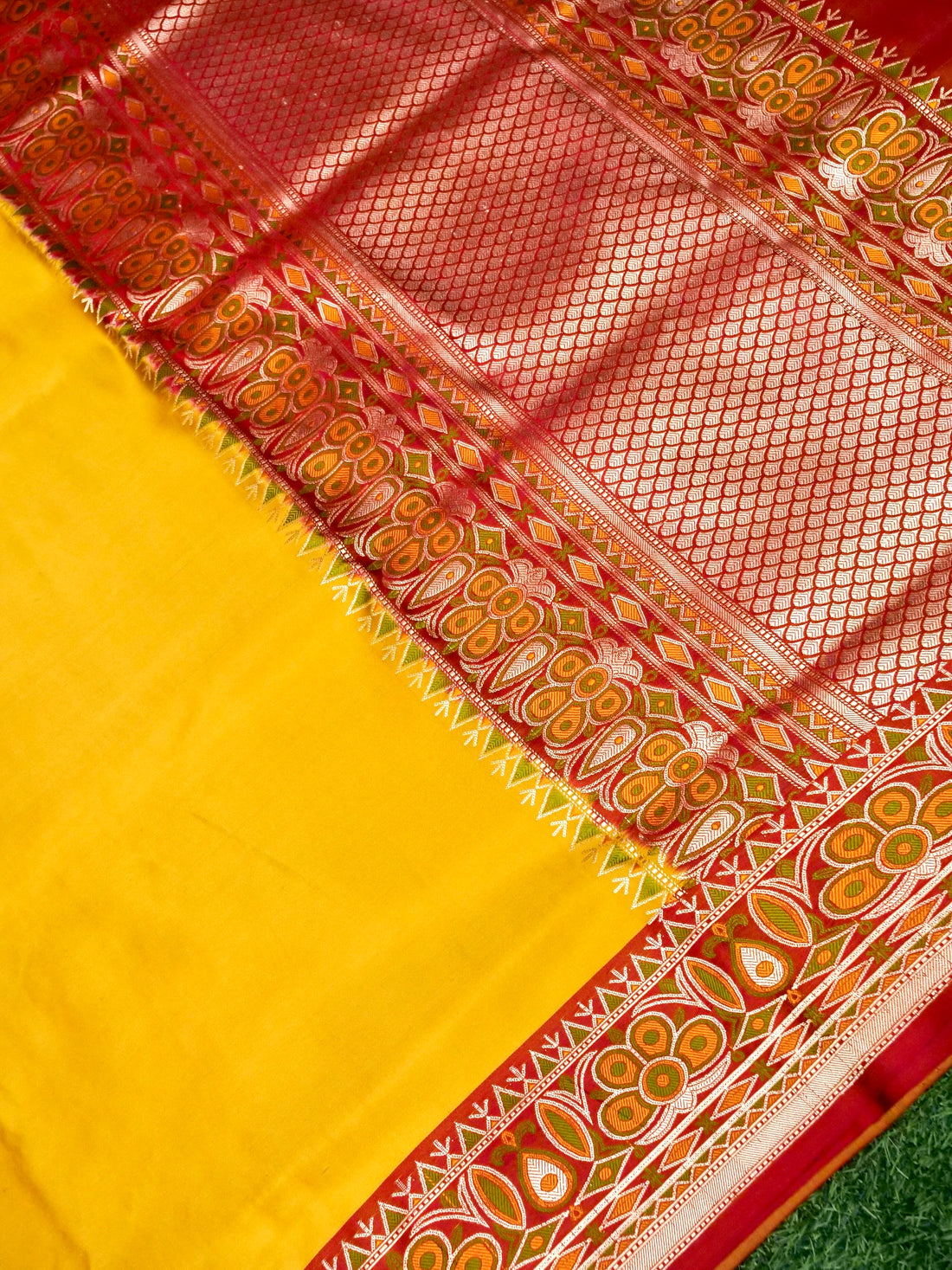 Banarasi Mashru Silk Kadiyal Handwoven Saree in Marigold Yellow - Khinkhwab