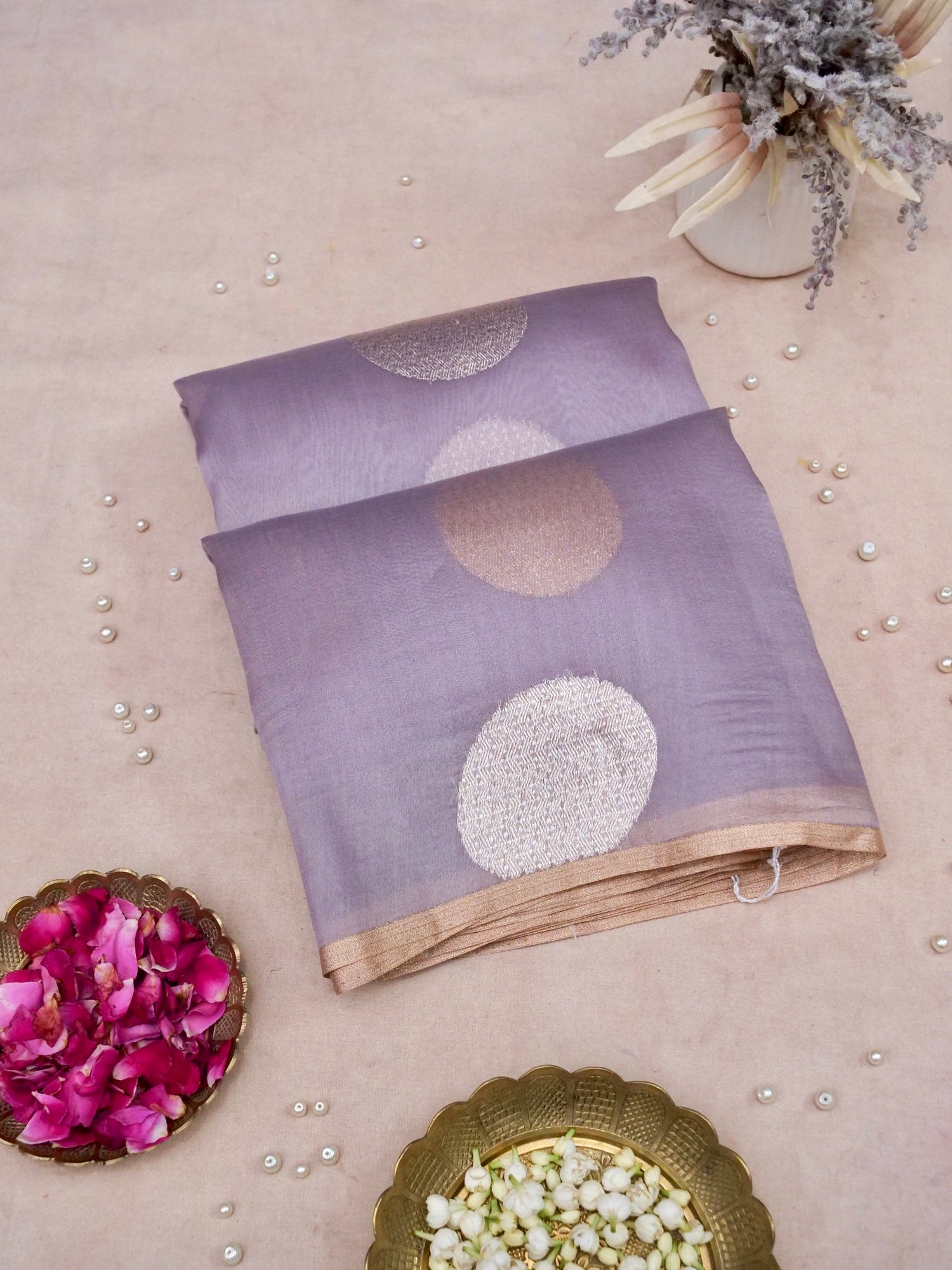 Kora silk Kadwa Banarasi saree in dusty lilac with intricate handwoven patterns, showcasing elegant traditional craftsmanship.