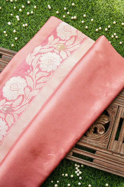 Pink fabric with floral patterns on a decorative surface