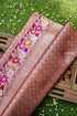 Decorative fabric with floral patterns on a textured surface