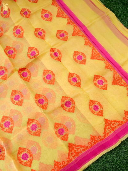 Handwoven Banarasi Organza Silk Saree in Butter Yellow with intricate gold zari work, crafted by Khinkhwab, showcasing fine Kora silk.