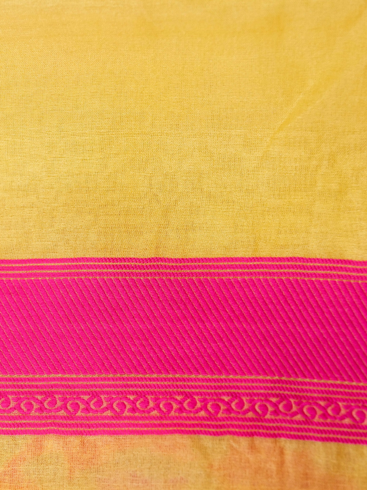 Handwoven Banarasi Organza Silk Saree in butter yellow with intricate gold zari work, displayed on a mannequin.