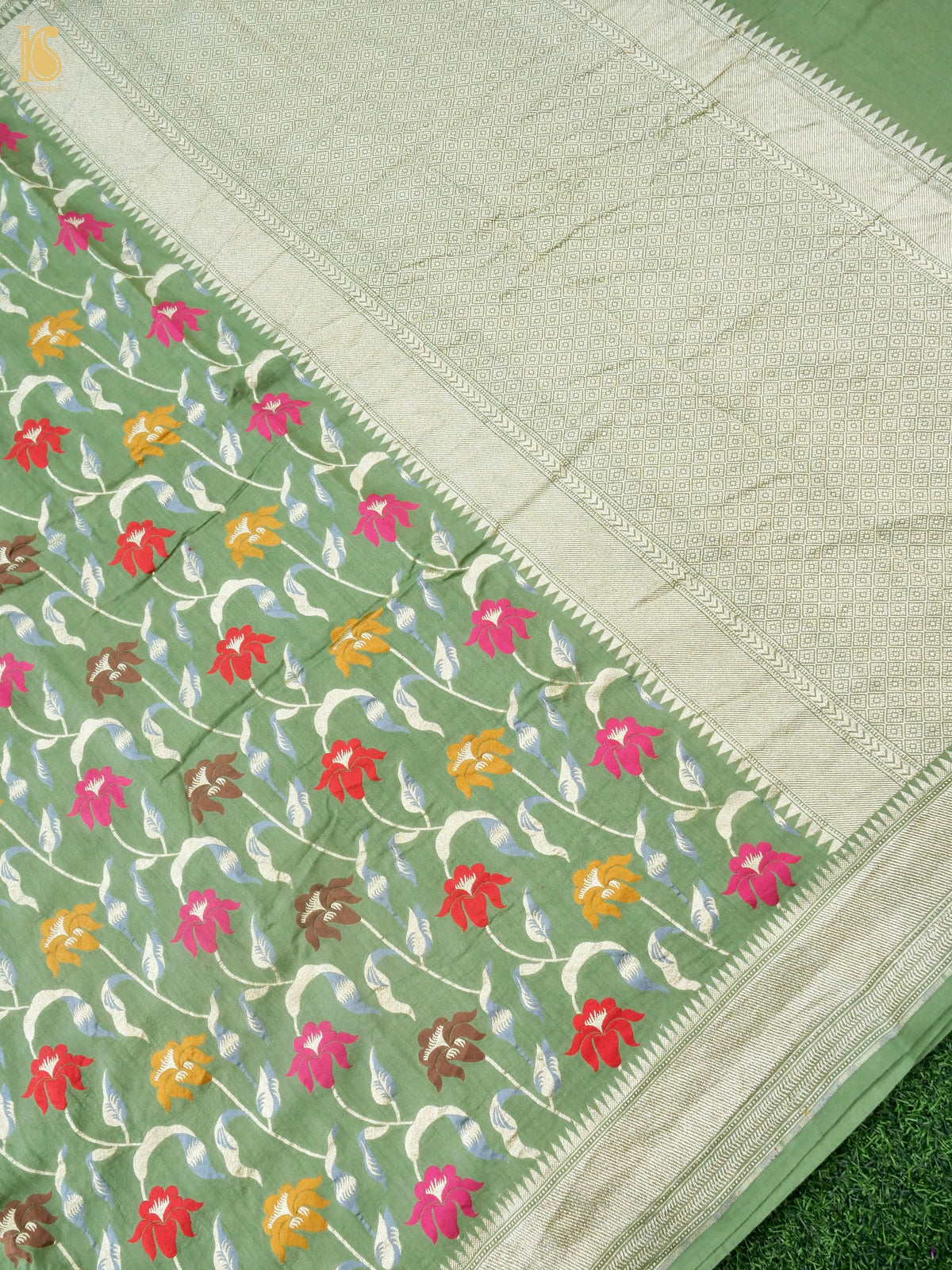 Khinkhwab Banarasi Tussar Georgette Meenakari cutwork saree in sage green drape with woven floral details