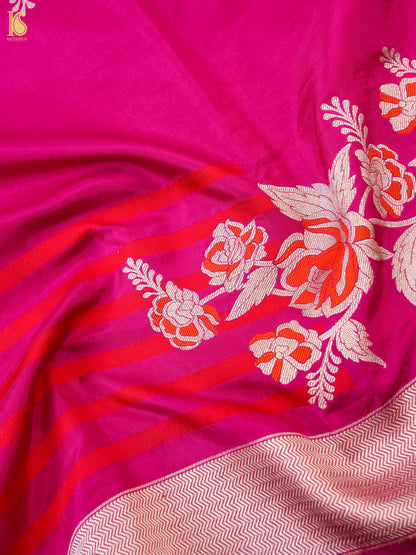 Rani pink Banarasi Katan Silk Ektara handwoven saree with intricate gold zari work, showcasing traditional craftsmanship.
