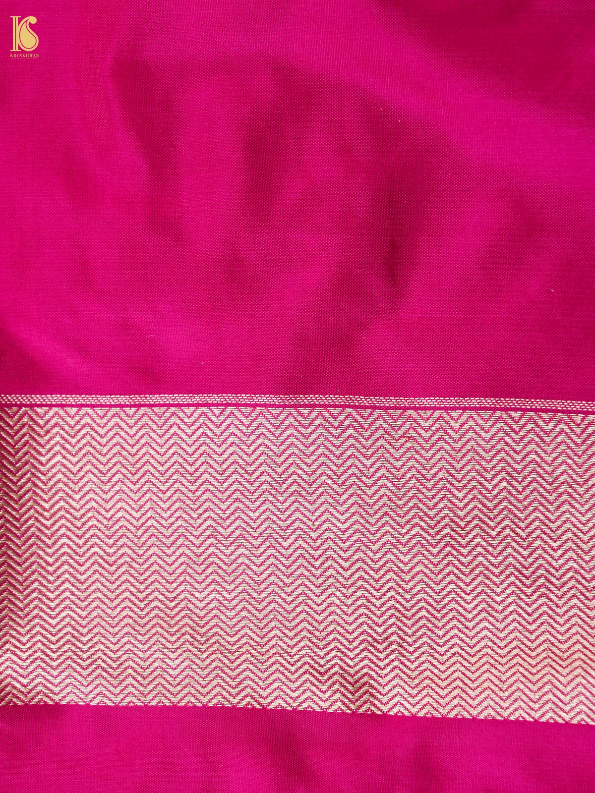 Elegant Rani Pink Banarasi Katan Silk Saree by Naqsh, featuring intricate handwoven patterns and luxurious silk texture.