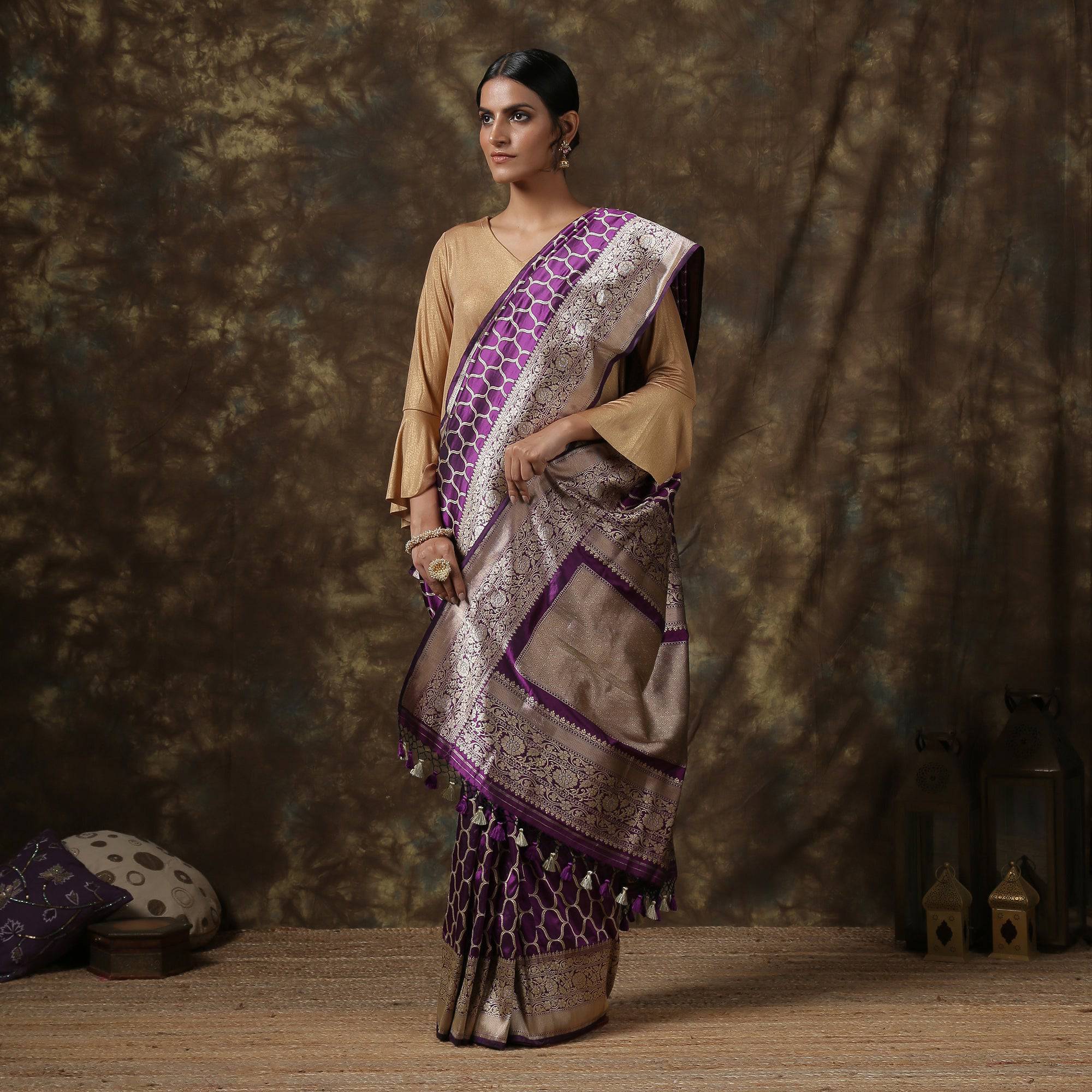 Mogra bun with silver blouse & purple saree makes a classic combination. |  Instagram