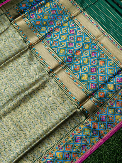 Handwoven Banarasi Katan Silk Patola Border Saree in Bottle Green and Blue