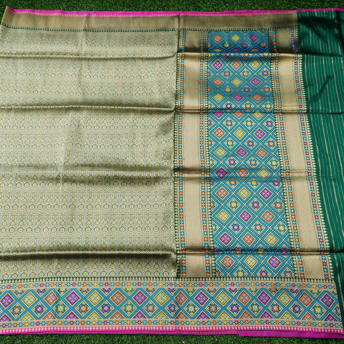 Handwoven Banarasi Katan Silk Patola Border Saree in Bottle Green and Blue