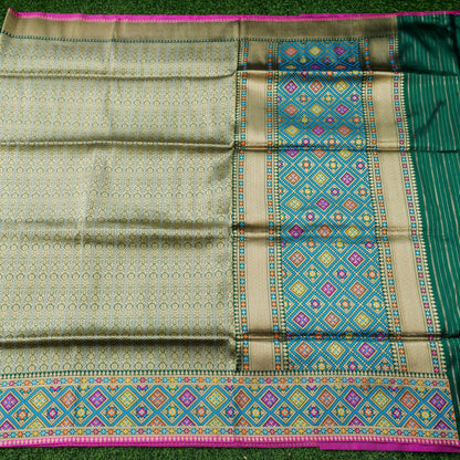 Handwoven Banarasi Katan Silk Patola Border Saree in Bottle Green and Blue